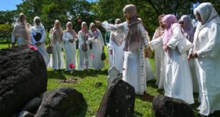 Tears, prayers as Asia mourns tsunami dead 20 years on